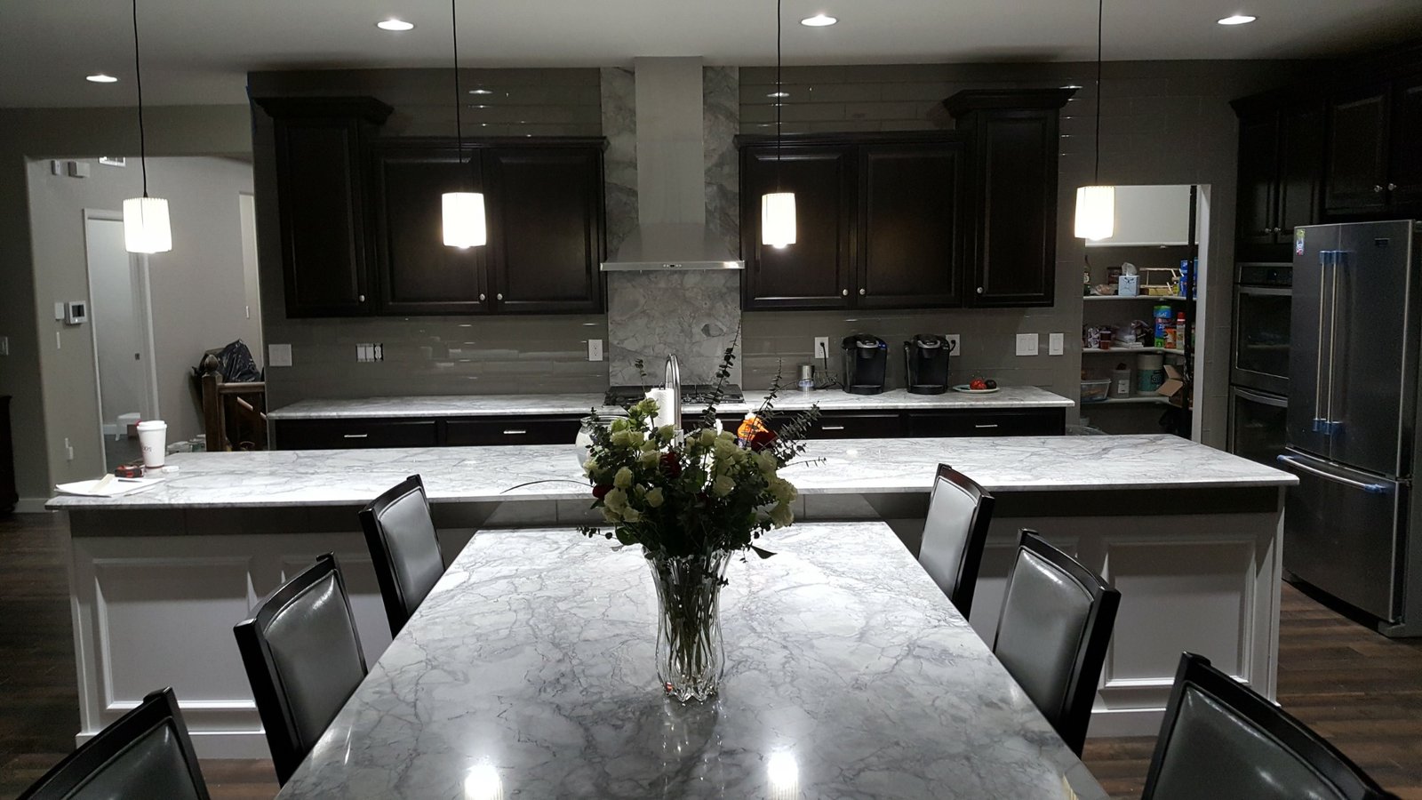 After: Arvada kitchen remodel with island and stone tops